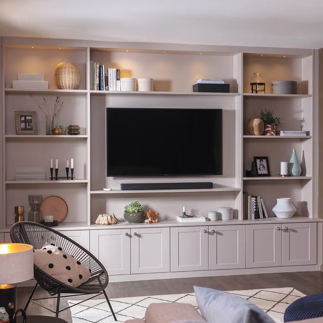 The Chelsea — bespoke fitted media wall with integrated shelving and lower cabinetry